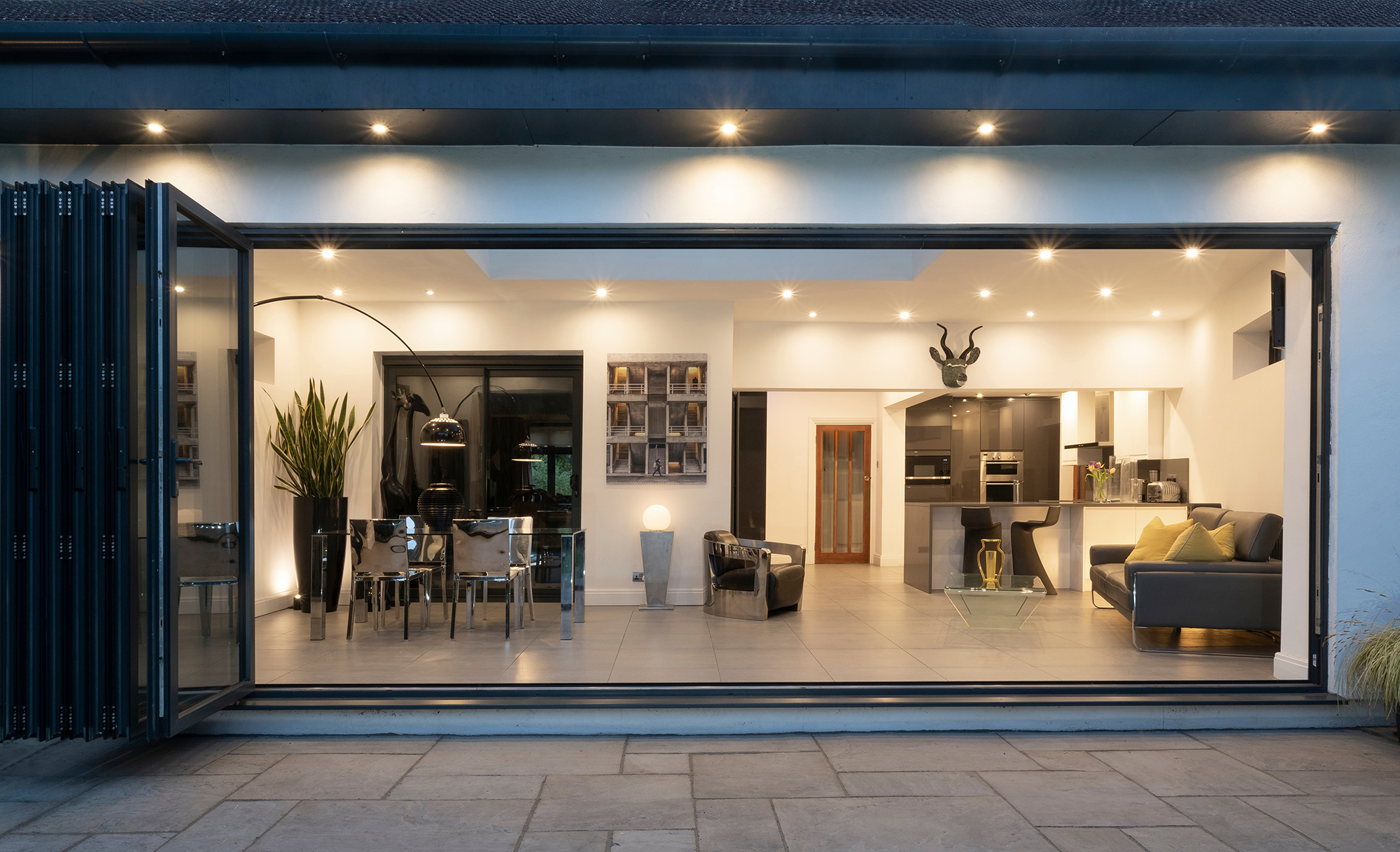 Stylish,,Open,,Bifold,Doors,Revealing,Interior,Of,A,Designer,,Lifestyle,