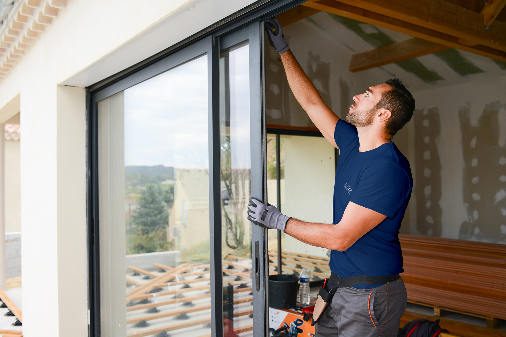 Handsome,Young,Man,Installing,Bay,Window,In,A,New,House