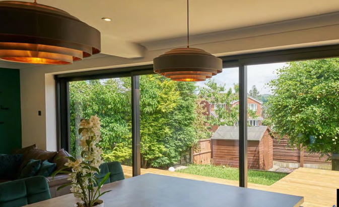 Stylish,,Open,,Bifold,Doors,Revealing,Interior,Of,A,Designer,,Lifestyle,